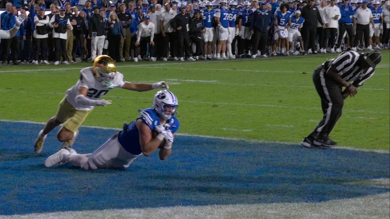 Walker Lyons dives to secure BYU’s winning touchdown catch against Notre Dame in Provo.
