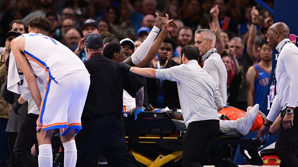 Jalen Williams raises his thumbs while medical staff wheel him off the court on October 25, 2026.