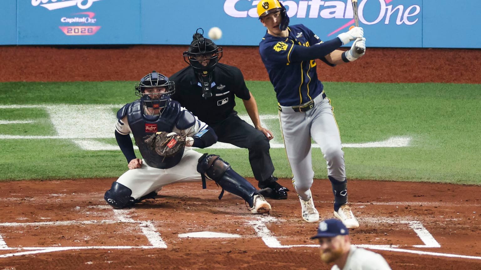 Cooper Pratt follows through on an RBI single in World Series Game 5 on October 28, 2026.