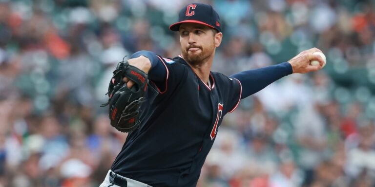 Foster Griffin delivers a pitch in a Cleveland Guardians uniform.